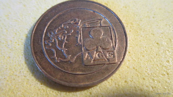 Жетон с грифоном. Латунь.