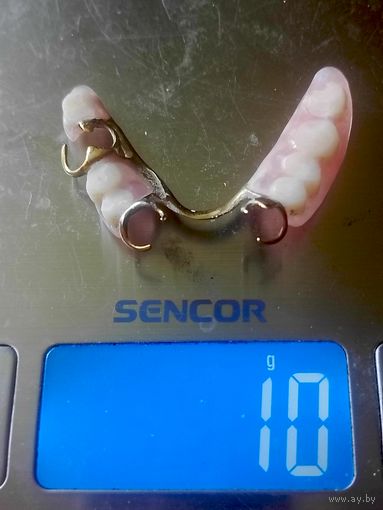 Протез зубной