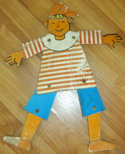 Старинная игрушка-раскладушка (дергунчик)