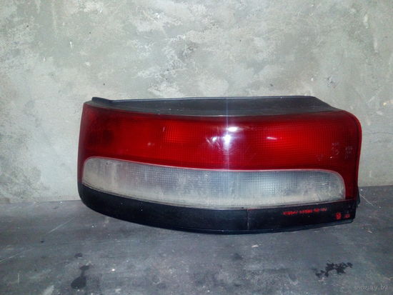 Фонарь задний левый Mazda 323 BG
