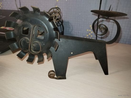 Подсвечник лев