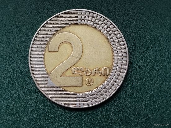 2 лари Грузия.
