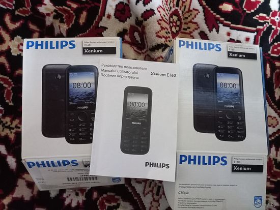 Мобильный телефон Philips Xenium E160 коробка паспорт рабочий состояние нового в коллекцию или в пользование
