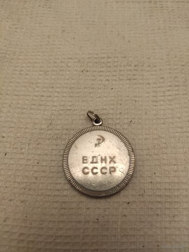 Медаль.