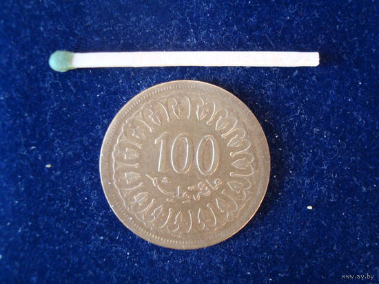 Монета 100 драхм, Тунис, 1999 г.