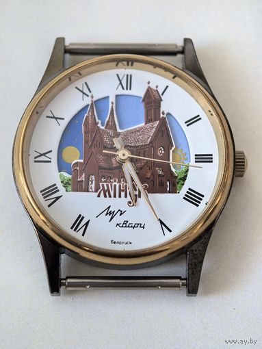 Новые !!! Часы Луч. Кварц. в упаковке и с документом. 1999 год. Красный костел. День. Ночь. солнышко и луна бегают между башенками.Новые . темный корпус.БОНУСОМ новая батарейка !!!