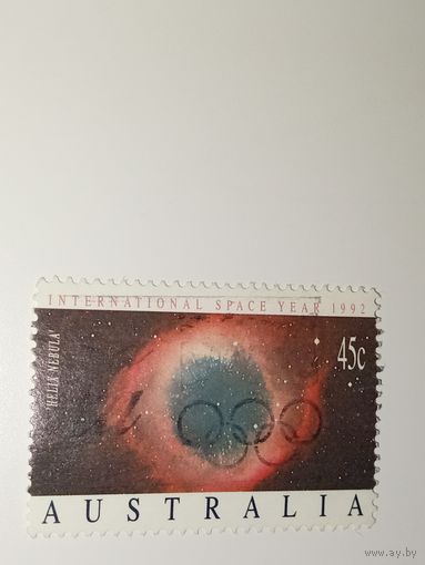 Австралия год 1992.  уманность Улитка (Helix Nebula) и олимпийские кольца.