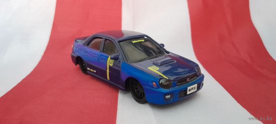 Машинка (модель) Bburago 1:43 Subaru Impreza WRX STI