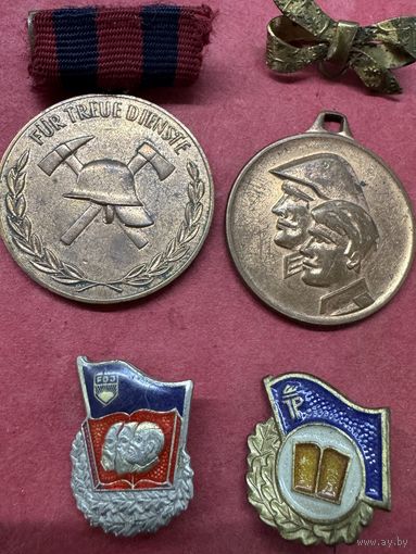 Медали ГДР.цена за все.