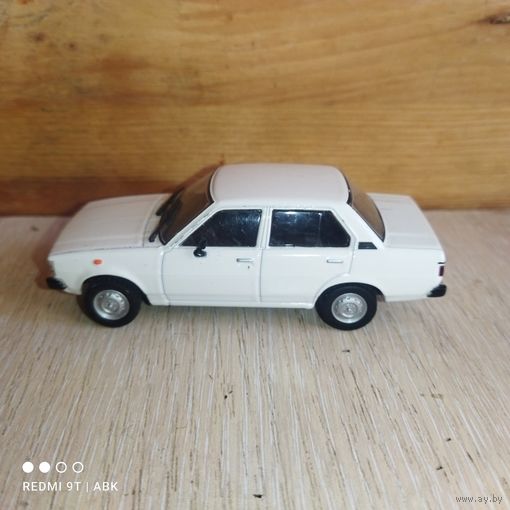 Модель Тoyota Corolla.1:43.