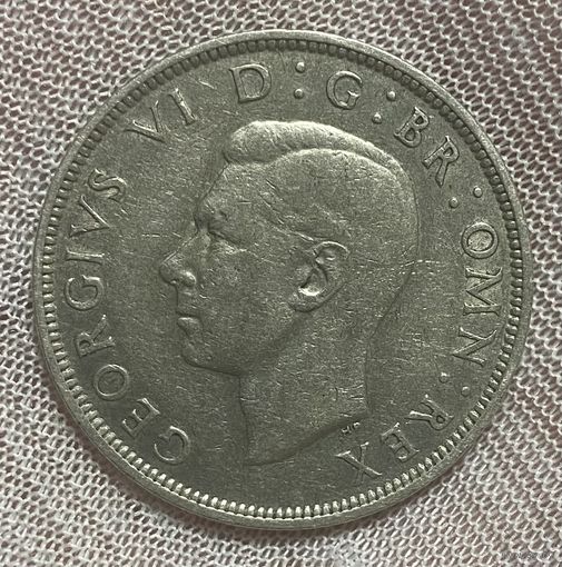 Монета 1/2 кроны 1942 год. Великобритания. Король Георг VI. Серебро