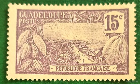 Гваделупа 1905. Стручки какао, бананы и вид на город Уэльмон