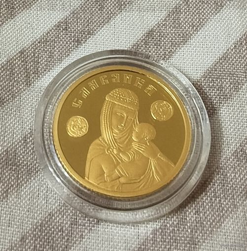 Славянка 50 рублей,золото 7.78г.