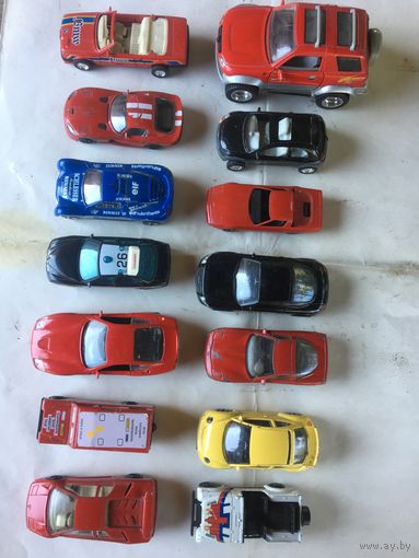 14 металлических импортных коллекционных авто ещё 90-х годов. все целы и только  у некоторых  нет стёкол.Двери  все работают!