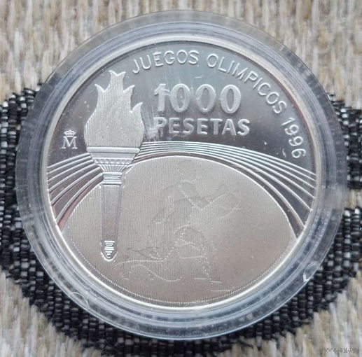 Испания 1000 песет 1995 года, Рroof. "Олимпиада 1996". Голограмма "Бег". Факел. СЕPЕБРО 925. Сторгуй за свою цену, предложи обмен!