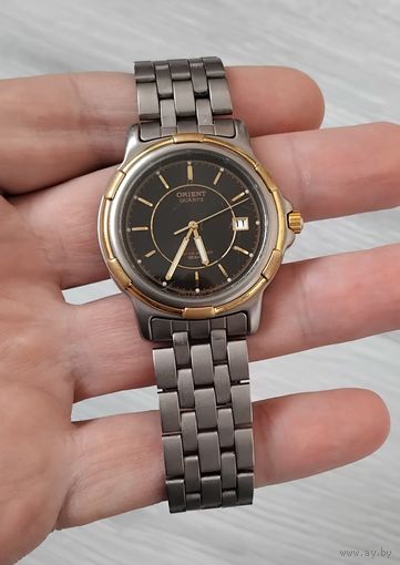 Часы ORIENT. Quartz. Titanium. 10 bar.