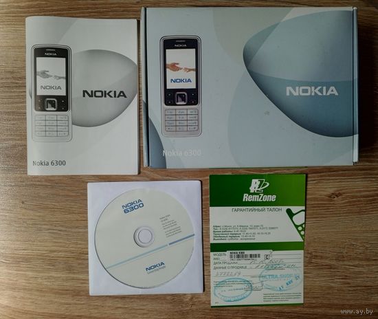 Коробка от телефона Nokia 6300 с паспортом, диском, гарантийным талоном.