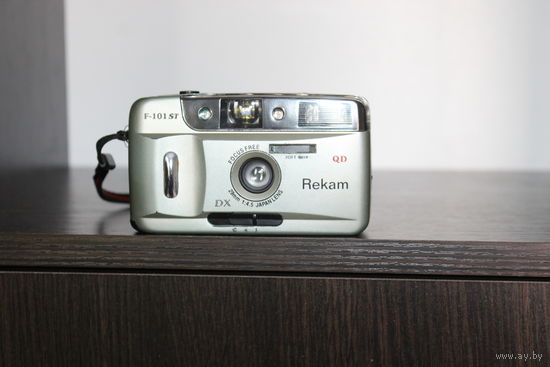 Пленочный фотоаппарат "Rekam", в не рабочем состоянии, в комплекте чехол + инструкция, в заводской упаковке.