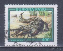 [1610] Буркина Фасо 1995. Фауна.Рептилии.Крокодил. Концовка серии.Гашеная марка.