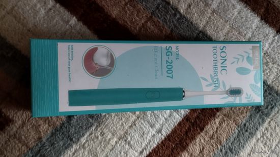 Электрическая зубная щётка