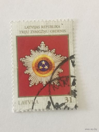Марка из серии "Высшие государственные награды стран Балтии" - Орден Трёх Звёзд