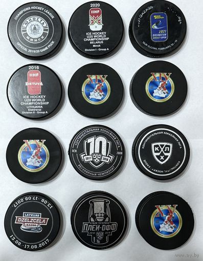 Коллекционные хоккейные шайбы.