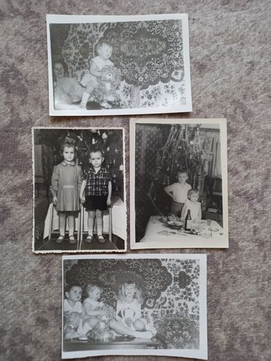 4 фота з дзецьмі і пляшкай партвэйна на стале.