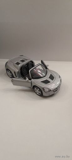 Машинка (модель) Welly opel speedster 2001 примерно 1:43