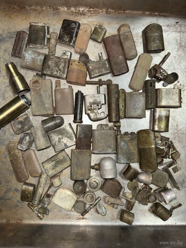 Зажигалки в ремонт и на запчасти.