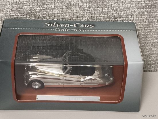 Модель автомобиля Ягуар, silver cars collection.