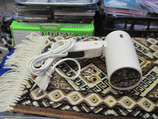 Фен электрический компактный.